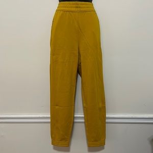 NWT Fabletics Eco Slim Sweatpants Mustard Size M